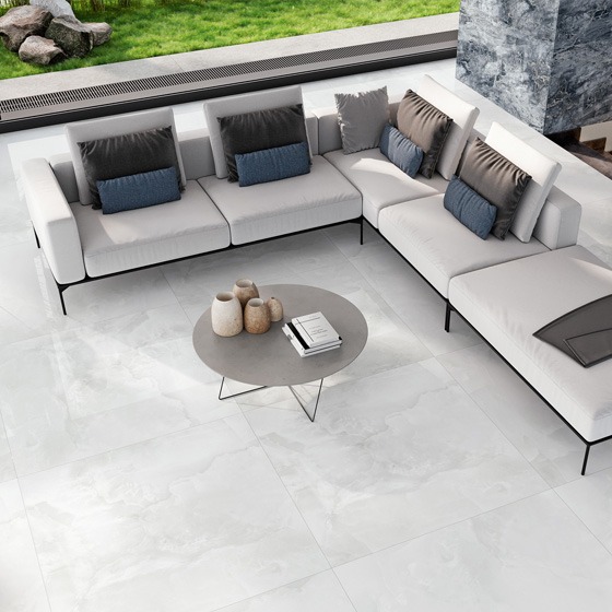 A well-lit image showcasing a variety of flooring materials, each sample clearly labeled. The scene should be clean and organized, with clear identification of each product. High-quality textures and lighting are important for bringing out the features of each product
